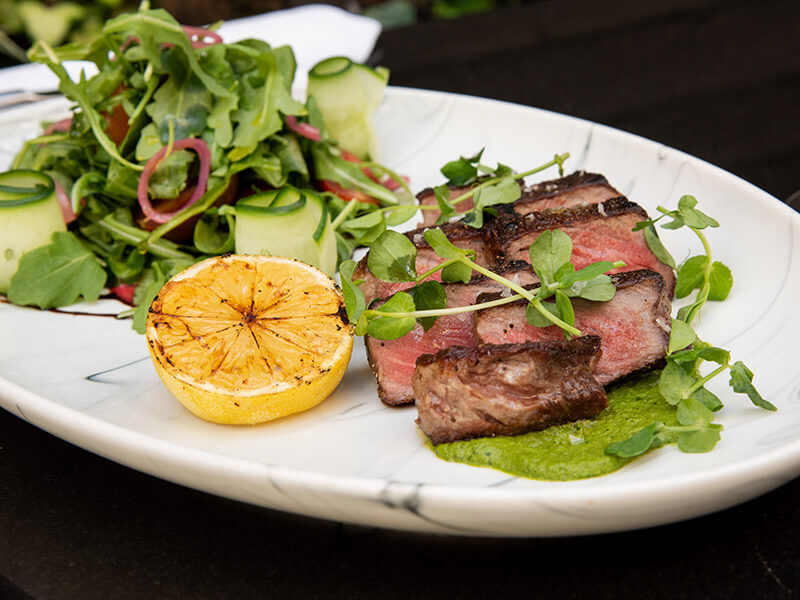 restaurant-for-lunch-in-yorkville 8 oz. AAA Striploin with House Mixed Greens salad
